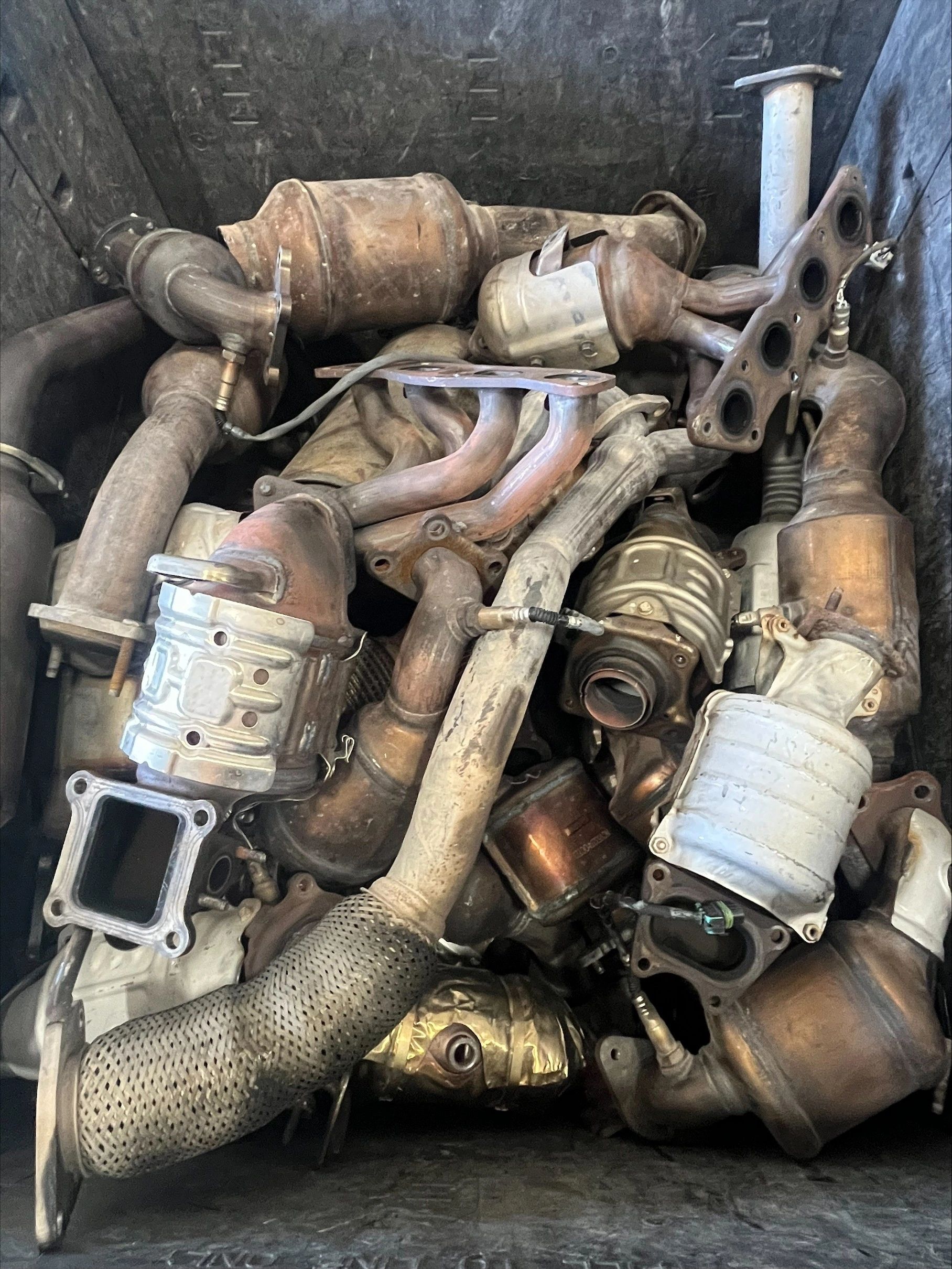 Scrap catalytic converters and exhaust components